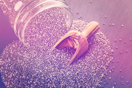 Healthy Chia seeds in glass jar close-up.の写真素材