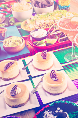 Fiesta party buffet table with dulce de lecheand other traditional Mexican food.の写真素材