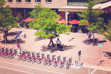 Denver, Colorado, USA-June 2, 2016. Red rental bikes near Union Station in Denver, Colorado.のeditorial素材