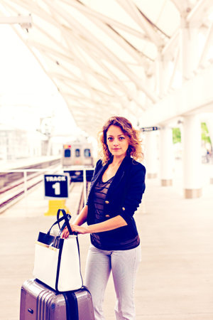 Young woman arrived to Union Station in Denver, Colorado.