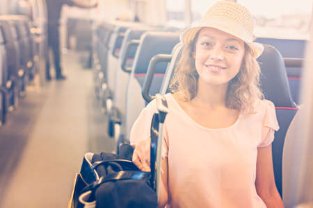 Young woman traveling from train station to International Airport.の写真素材