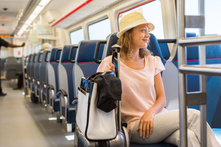 Young woman traveling from train station to International Airport.