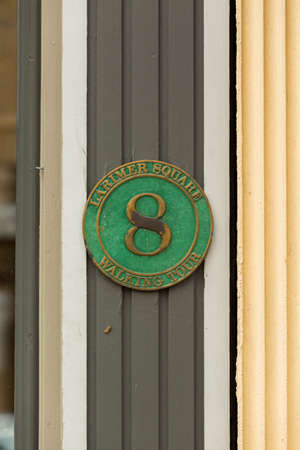 Denver, Colorado, USA-June 20, 2016. Walking tour marker on historical building on Larimer Square.のeditorial素材
