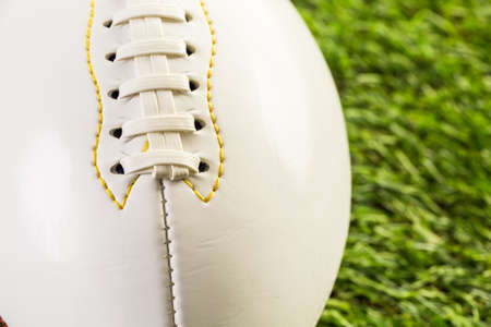 American Football Close up on on green grass.の写真素材