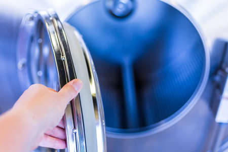 Industrial washing machines in a publicの写真素材