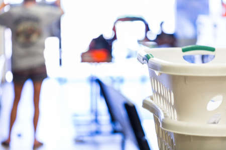 Industrial washing machines in a public laundry.の写真素材
