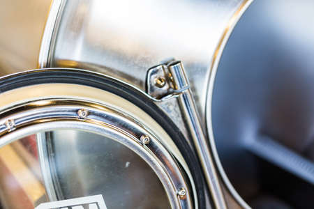 Industrial washing machines in a public laundry.の写真素材