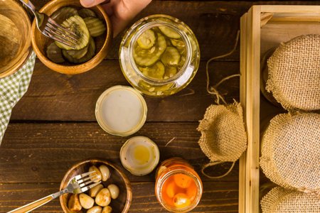 Homemade canned organic vegetables in glass jars.