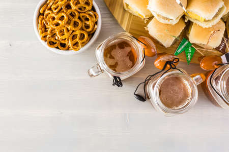 Sliders with veggie tray on the table for the football party.の写真素材