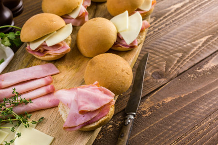Ham and cheese sliders on homemade dinner rolls.の写真素材