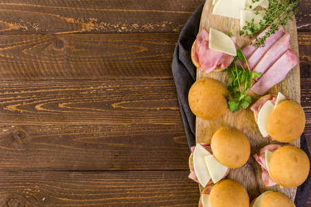 Ham and cheese sliders on homemade dinner rolls.の写真素材
