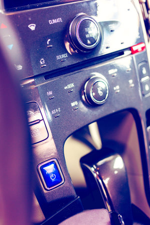 Interior of the electric car parked in the garage.