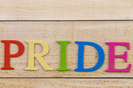 Rainbow Gay Pride sign on wood background.の写真素材