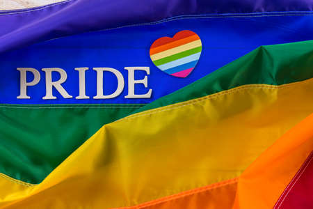 Rainbow Gay Pride flag with Pride sign.の写真素材