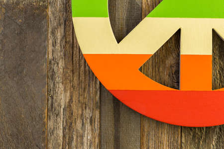 Rainbow Gay Pride peace sign on a wood backgroundの写真素材