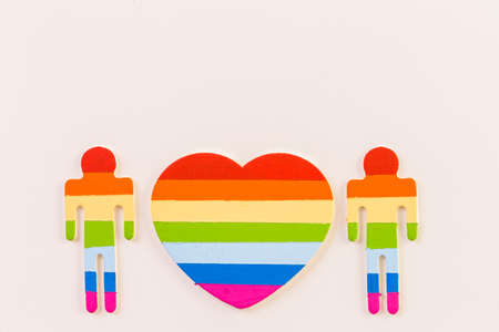 Rainbow Gay Pride male nad female cutouts on a white background.の写真素材
