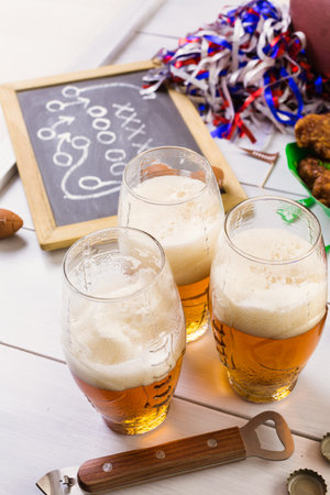 Snacks for watching a football game. Super Bowl day party.の写真素材