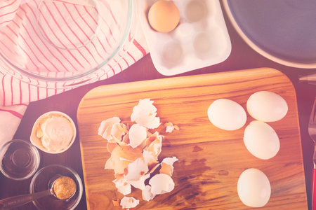 Preparing deviled eggs with organic eggs for appetizer. Step by step recipe.