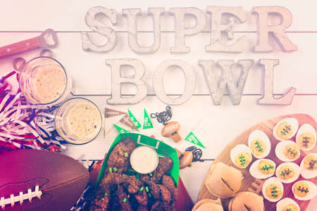Snacks for watching a football game. Super Bowl day party.の写真素材