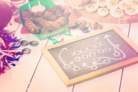 Snacks for watching a football game. Super Bowl day party.の写真素材