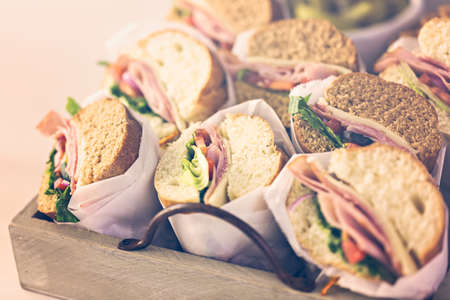 Fresh sub sandwich on white and wheat hoagies.の写真素材