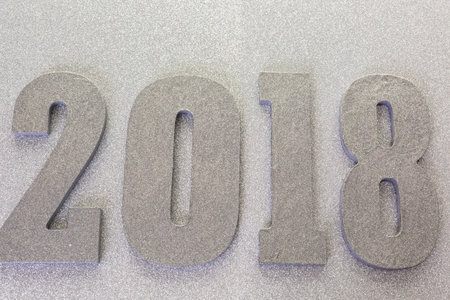 New year decoration. Closeup on silver 2018.