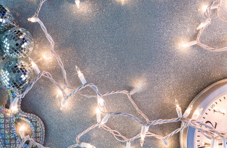 New Year Eve party decorations on silver background.の写真素材
