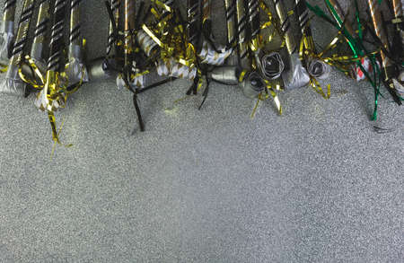 New Year Eve party decorations on silver background.の写真素材