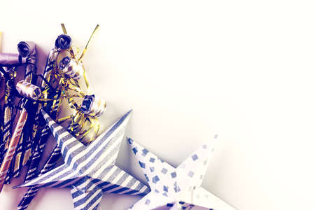 New Year Eve party blowouts on a white background.の写真素材