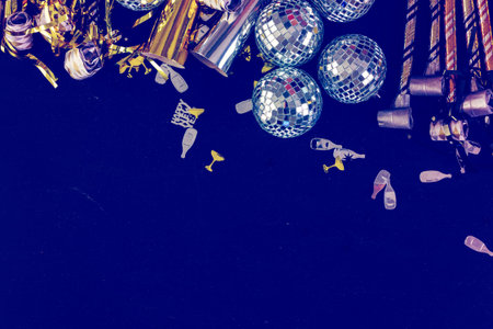 New Year Eve party decorations on black board.