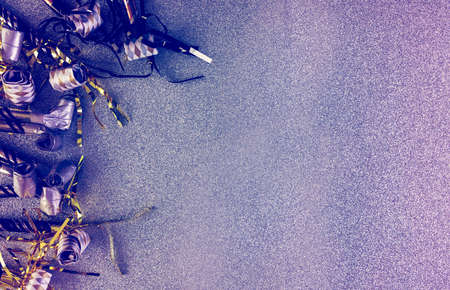 New Year Eve party decorations on silver background.の写真素材