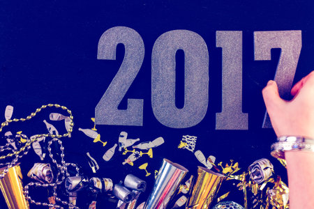 New Year Eve party decorations with year on a black background.