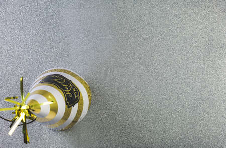 New Year Eve party decorations on silver background.の写真素材