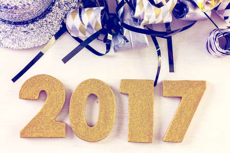 New Year Eve party decorations with year on a white background.の写真素材