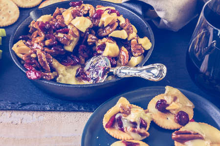 Caramel nut and cranberry brie appetizer for Christmas party.の写真素材