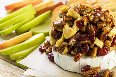 Caramel nut and cranberry brie appetizer for Christmas party.の写真素材