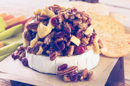 Caramel nut and cranberry brie appetizer for Christmas party.の写真素材