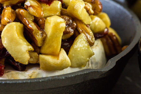 Caramel nut and cranberry brie appetizer for Christmas party.の写真素材