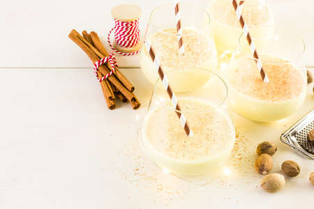 Traditional holiday egg nog garnished with freshly ground nutmeg.の写真素材