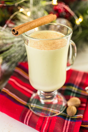 Traditional holiday egg nog garnished with freshly ground nutmeg.の写真素材