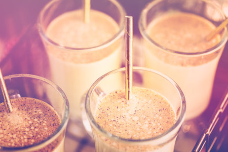 Traditional holiday drink egg nog garnished with nutmeg.の写真素材