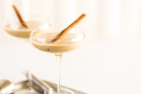 Holiday eggnog cocktail with dark rum and milk garnished with nutmeg.の写真素材