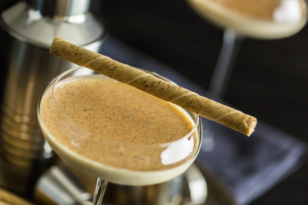 Egg nog cocktail in tall glasses on the tray at the minibar.の写真素材