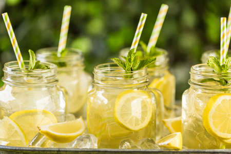 Beverage tray with with iced tea with citrus.の写真素材