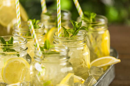 Beverage tray with with iced tea with citrus.の写真素材