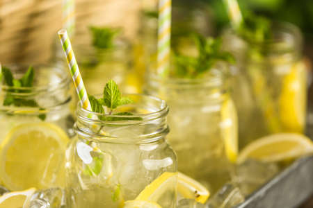 Beverage tray with with iced tea with citrus.の写真素材