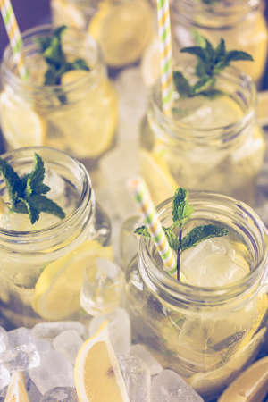 Beverage tray with with iced tea with citrus.の写真素材