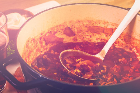 Cooking homemade turkey chili for dinner.