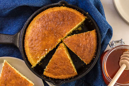 Step by step. Organic sweet cornbread baked in castiron pan.の写真素材