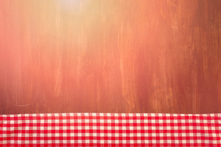 Dish towel on a wood background.